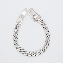 Silver chain bracelet on a white background