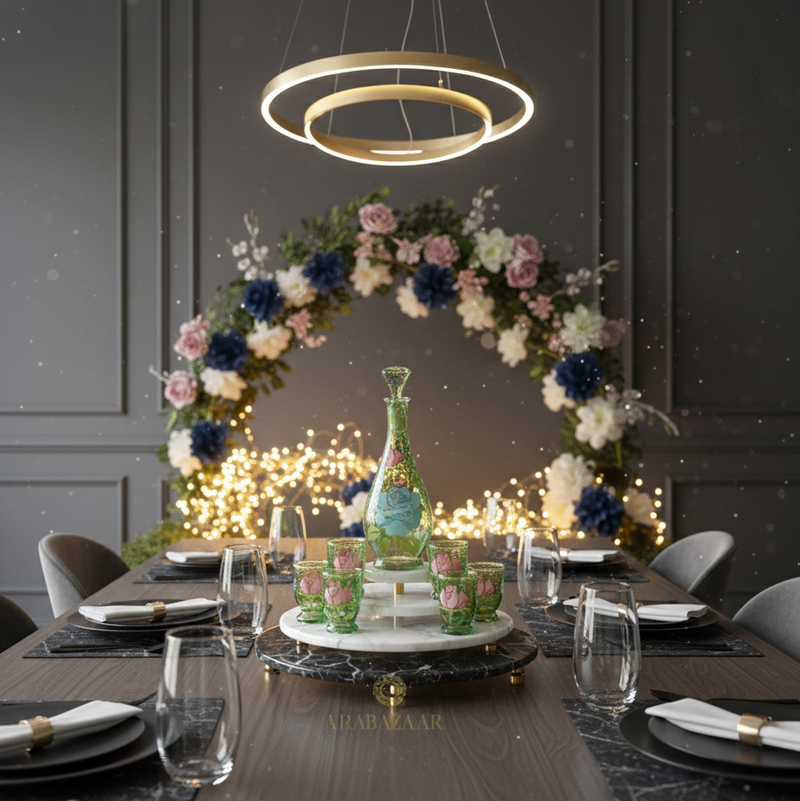Elegant dining room setup with floral arch, table setting, and decorative lighting.