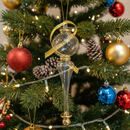 Decorative Christmas ornament on a tree with colorful baubles