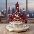 Decorative red and gold vase set on a marble stand with cityscape background