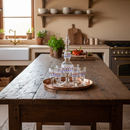 Kitchen with wooden table, rustic decor, and natural light
