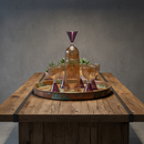 Decorative glassware set on a wooden tray with a gray background